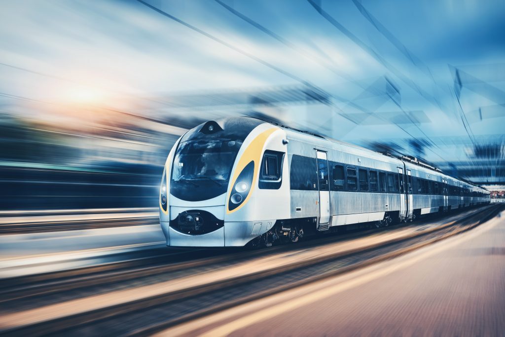 High,Speed,Passenger,Train,In,Motion,On,The,Railway,Station